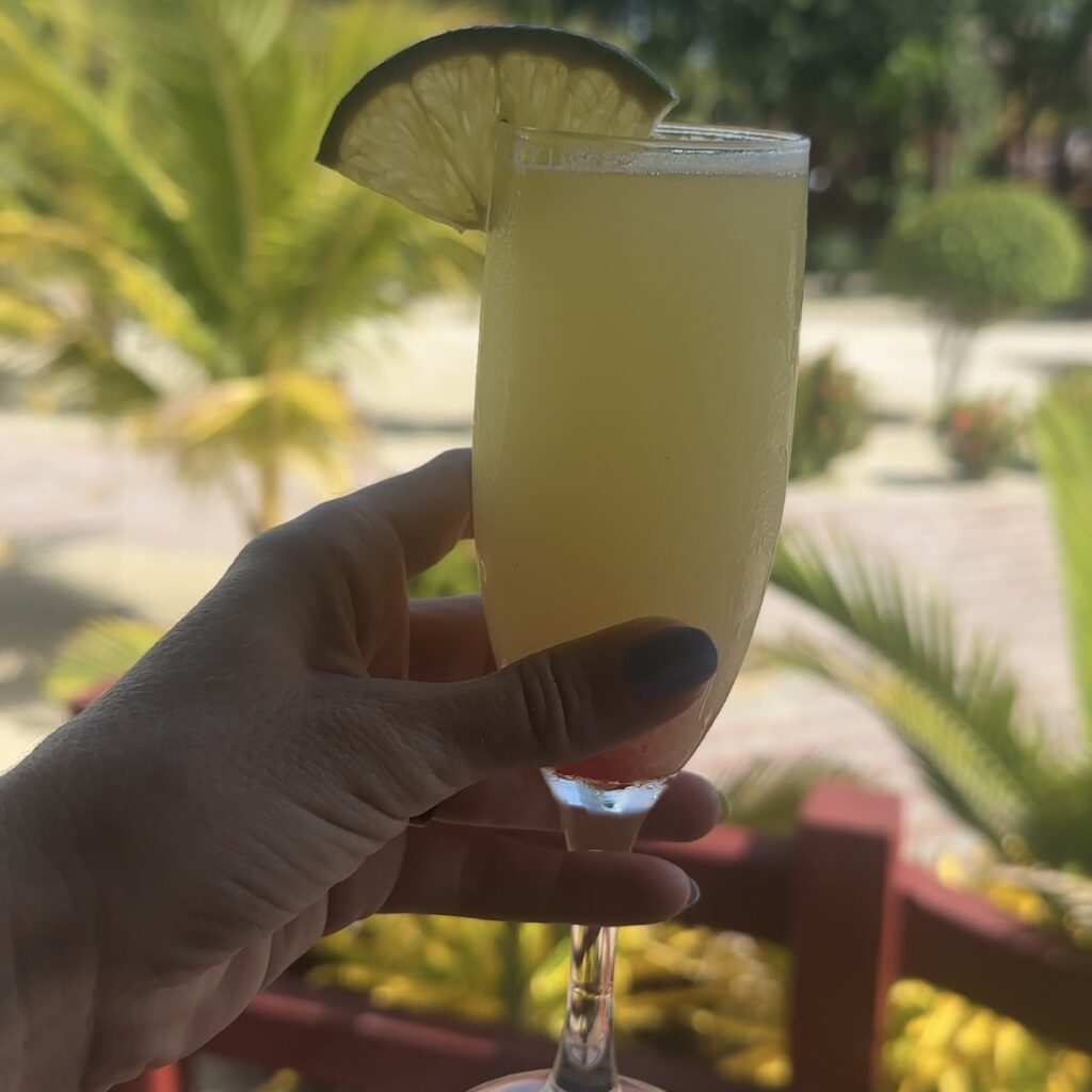 woman-holding-heart-shaped-fry-jack-with-red-jam-in-belize